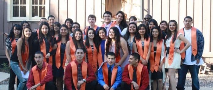 Students from BUILD youth entrepreneurship program pose for graduation