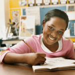 Girl smiling in classroom