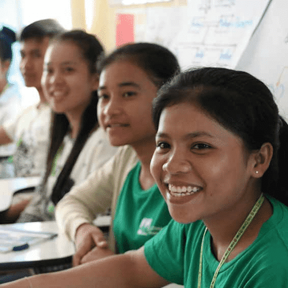 People smiling in classroom