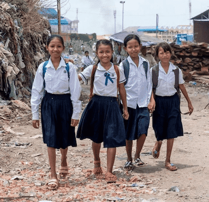 Four students walking outside together. The Cambodian Children's Fund is propelling STEAM education in Cambodia forward.