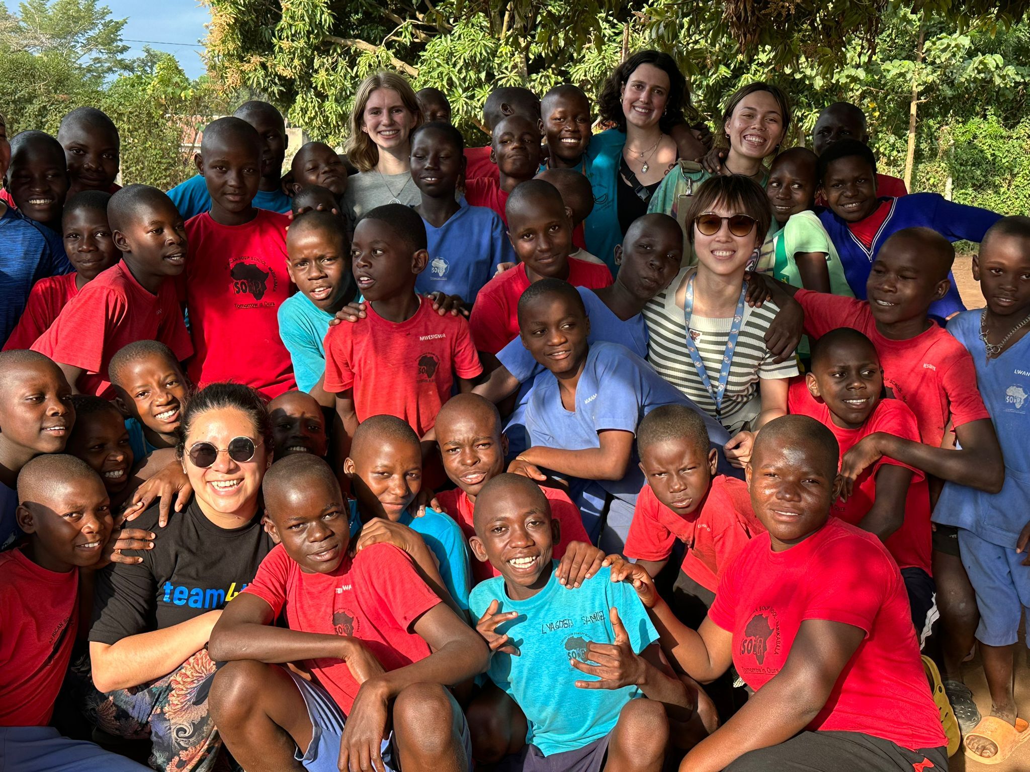 Participants in Team4Tech's University Internship Program working to support our nonprofit partners in Uganda