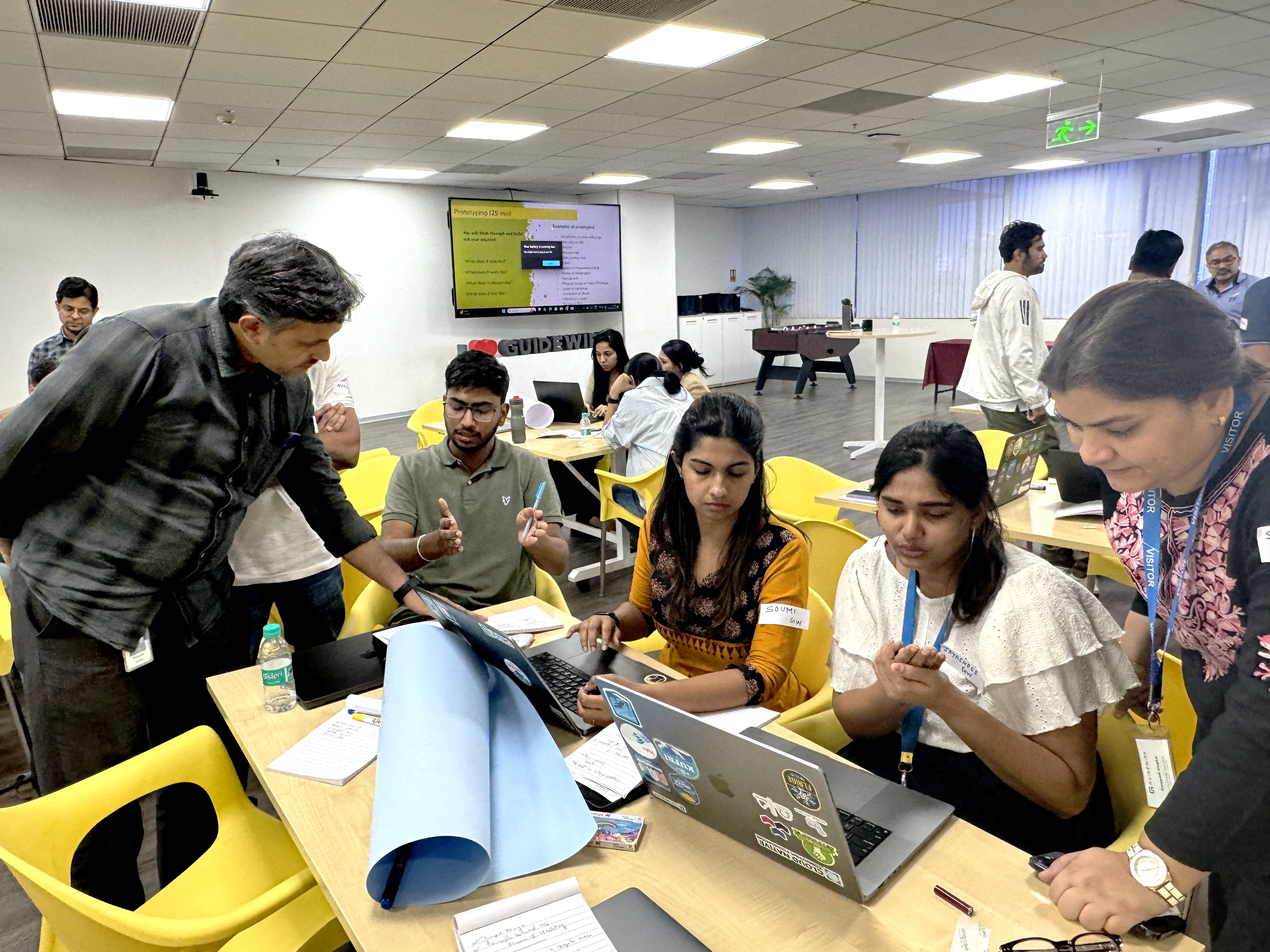 Team4Tech facilitates design thinking workshop onsite in Bengaluru with Guidewire Software and EY