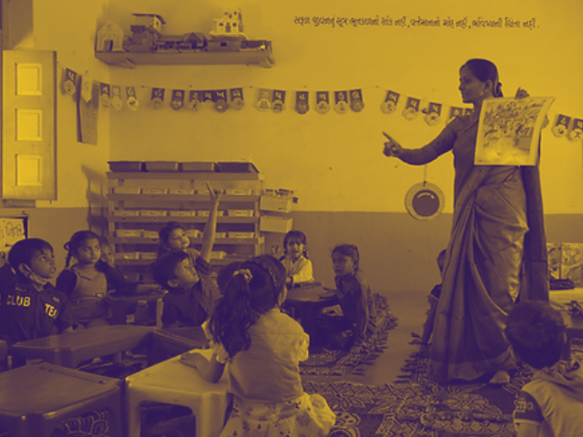 Team4Tech supports India-based NGO Reap to Teach in Accelerating their Impact | Image shows educator and classroom of small children in Arunachal Pradesh, India